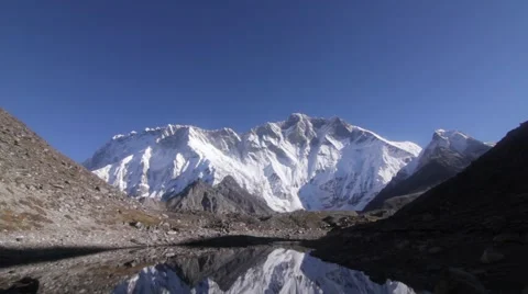 View of snowcapped mountain and lake Stock Footage 62388844