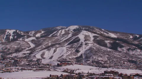 View of snowcapped mountain and ski resort Video stock 57814799