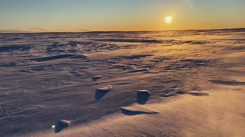 View from the snowmobile at speed. Red sun at sunset Stock Footage 244481950