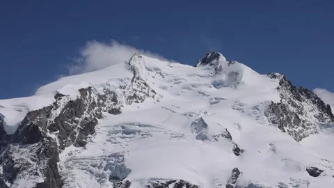 View of the snowy Gornergrat mountain peak in Zermatt, Switzerland. Stock Footage 342283102