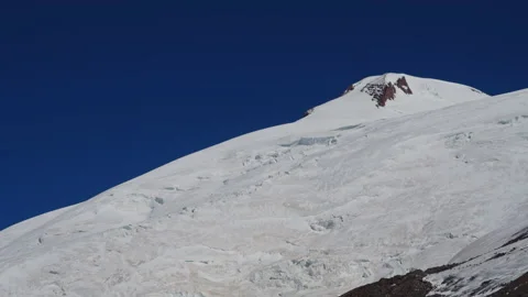 View of the snowy peaks of Elbrus the highest mountain and volcano in Europe Stock Footage 143681682