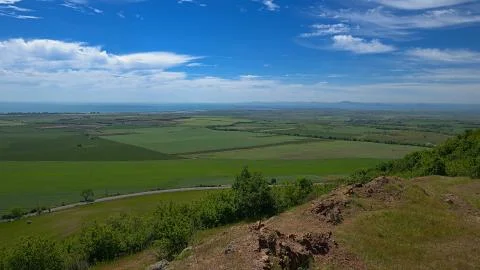 View of the sown fields in the background of the Black Sea coast. Stock Photos