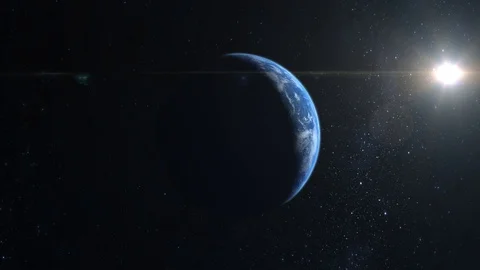 A view from space. The earth is approaching. The camera flies around the planet Stock Footage 105541164