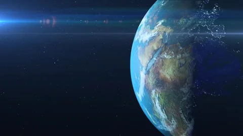  View from space. The earth rotates towards the sun. The camera moves away. Real Stock Footage 241796953