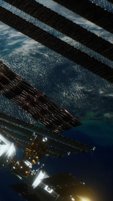 View of a spacecraft with solar panels above the Earth at night Stock Footage 344958424