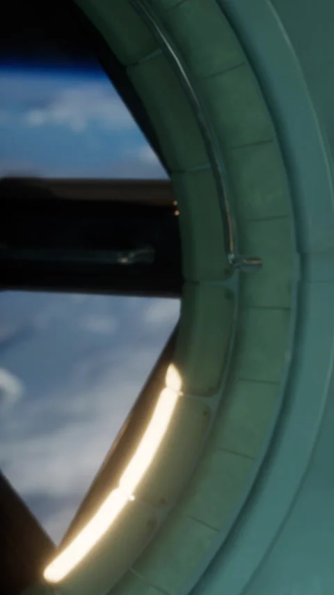 View from a spacecraft window showing equipment and space outside Stock Footage 344961741