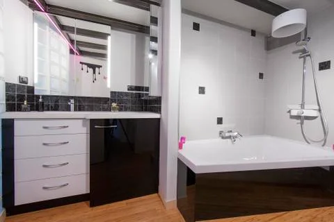 View of a spacious and elegant bathroom Stock Photos