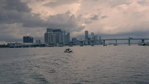 View of speedboat speeding across the Florida Intra Coastal Waterway Miami Beach Stock Footage 258849124