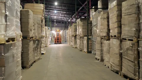 View of speeding forklift in warehouse Video stock 97193624