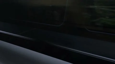 View from speeding railway train flashing fast past window. London Stock Footage 205572075