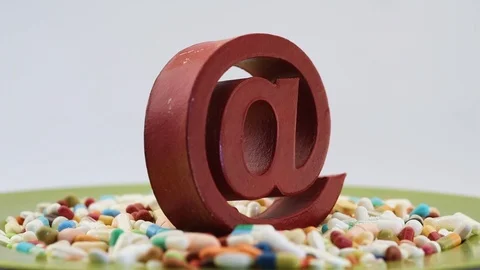 View of spinning at sign among different pills Stock Footage 97823307