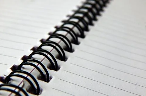 View of a spiral bound note with lined paper sheets Foto stock