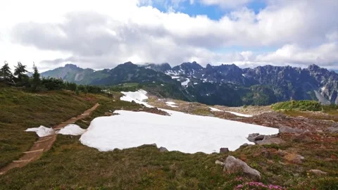 View of Spray Park trail with snow and mountains in Mount Rainier National Park, Video stock 332083157