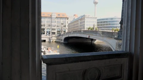 View of Spree river with sightseeing boat and Berlin TV tower in background. Stock-Footage 116251209