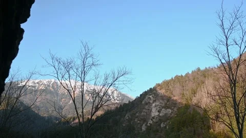 View of spruce forest in mountains from old castle window Stock Footage 150552730