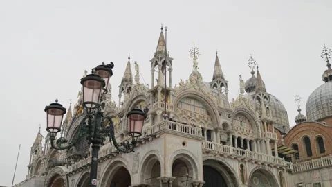 View of the St. Mark's Square with Saint Marks Basilica, the main tourist Stock Footage 292223278