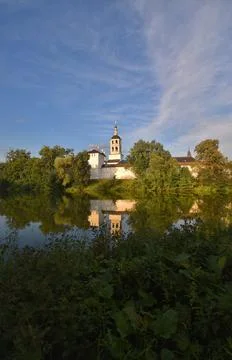 View of the St. Paphnutiev Borovsky Monastery from the ponds in summer. Stock Photos