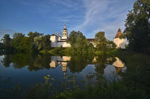 View of the St. Paphnutiev Borovsky Monastery from the ponds in summer. Stock Photos