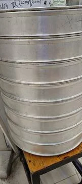 View of stack of round trays for steamed buns Stock Photos