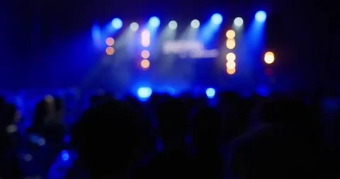 A view of the stage illuminated by blue light from a dark auditorium Stock Footage 270222028