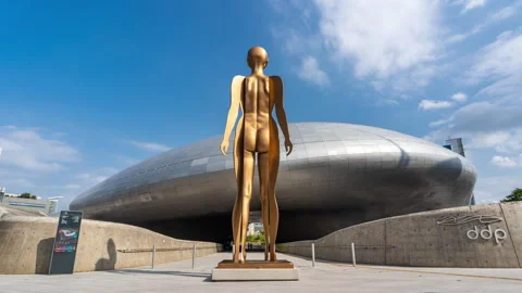 View of the statue The Birth of a Heroine in front of the famous DDP building Stock Footage 288338074