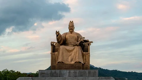 View of Statue of King Sejong the Great against beautiful sunset background Stock Footage 288350905