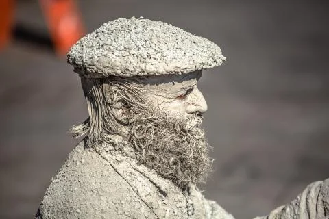 View of statue man, doing shoemaker acting on the street, Porto city, Portuga Stock Photos