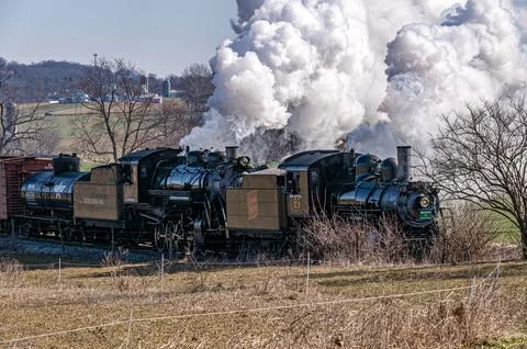 View of a Steam Double Header Freight Train Traveling Thru Rural America on a Stock Photos