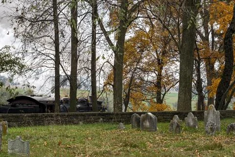 View of a Steam Engine Passing an Old Cemetery, Blowing Smoke Stock Photos