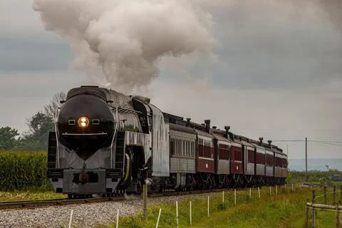 View of a Steam Passenger Train Approaching, Traveling Thru Rural America Stock Photos