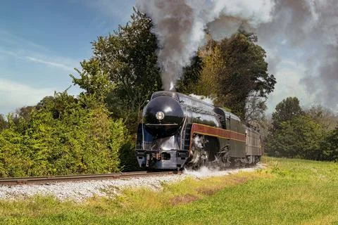 View of a Steam Passenger Train Approaching, Traveling Thru Rural America Stock Photos