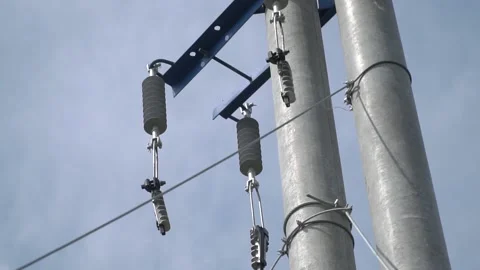 View of a steel pole with big cables on it, power station structures Stock Footage 158958533