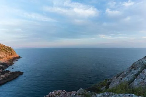 View of steep cliffs at Kullaberg, Sweden. Stock Photos
