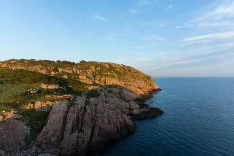 View of steep cliffs at Kullaberg, Sweden. Stock Photos