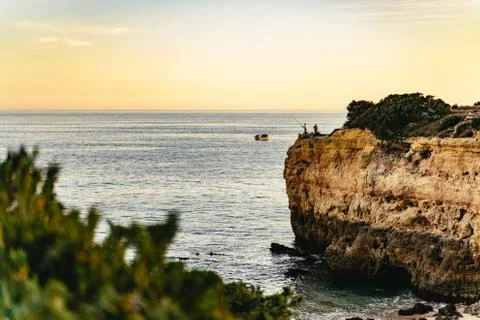 View of the steep cliffs in Praia de Albandeira Stock Photos