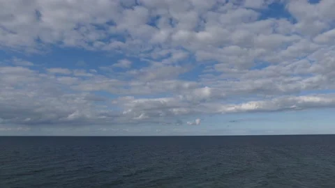 View from the steep coast to ocean - blue sky with some clouds (2 video clips) Stock Footage 139146911
