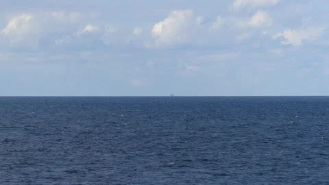 View from the steep coast to ocean - blue sky with some clouds Stock-Footage 139147117