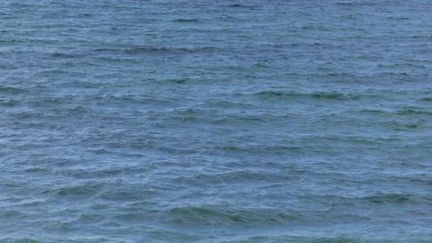 View from the steep coast to the ocean - water template, texture, pattern Stock Footage 139152670