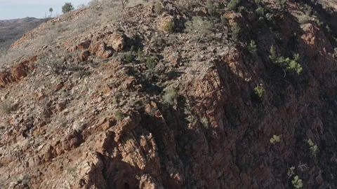 View of the steep side of a canyon from a drone Stock Footage 190932547