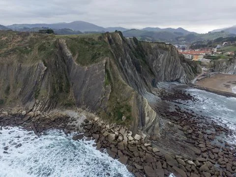 View on steeply-tilted layers of flysch geological formation on Atlantic co.. Stock Photos