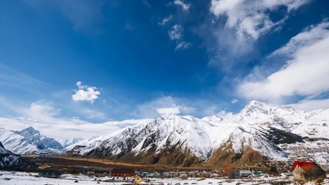 View From Stepantsmimda To Gergeti Trinity Church Or Tsminda Sameba - Holy Stock Footage 105127721