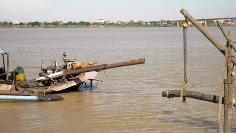 View of the stern of a dredging boat carrying a sand pumping machine  Stock Footage 102476633