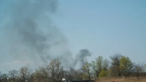View from a stern of floating boat in the river in spring. Black smoke from a Video stock 105882337