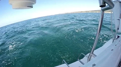 View from stern Sailing fast on monohull sailboat off coast of California Stock Footage 65963922