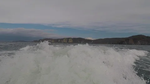 The view from the stern of the speedboat on the storm waves. Stock Footage 106775513