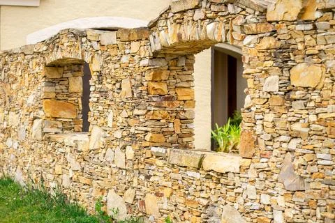 View of a stone brick wall with arched windows in Lower Austria Stock Photos