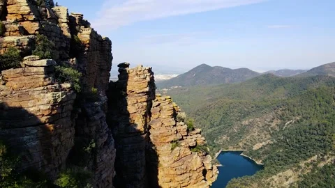 View of the stone formations against the background of mountain lake Stock Footage 241245926