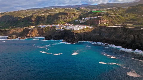 View of stone houses with red tiled roofs and wooden balconies in Tenerife. Stock Footage 259325499