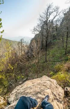 View from a stone on a mountainside, spring forest on a mountain Stock Photos