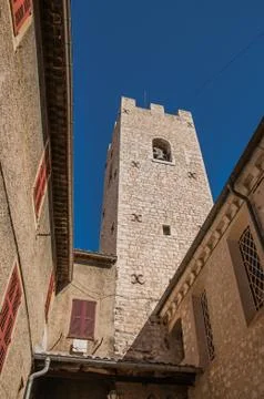 View of stone steeple tower next to church in Vence. Stock Photos